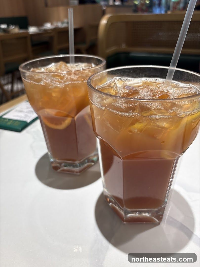 Two iced teas with orange slices