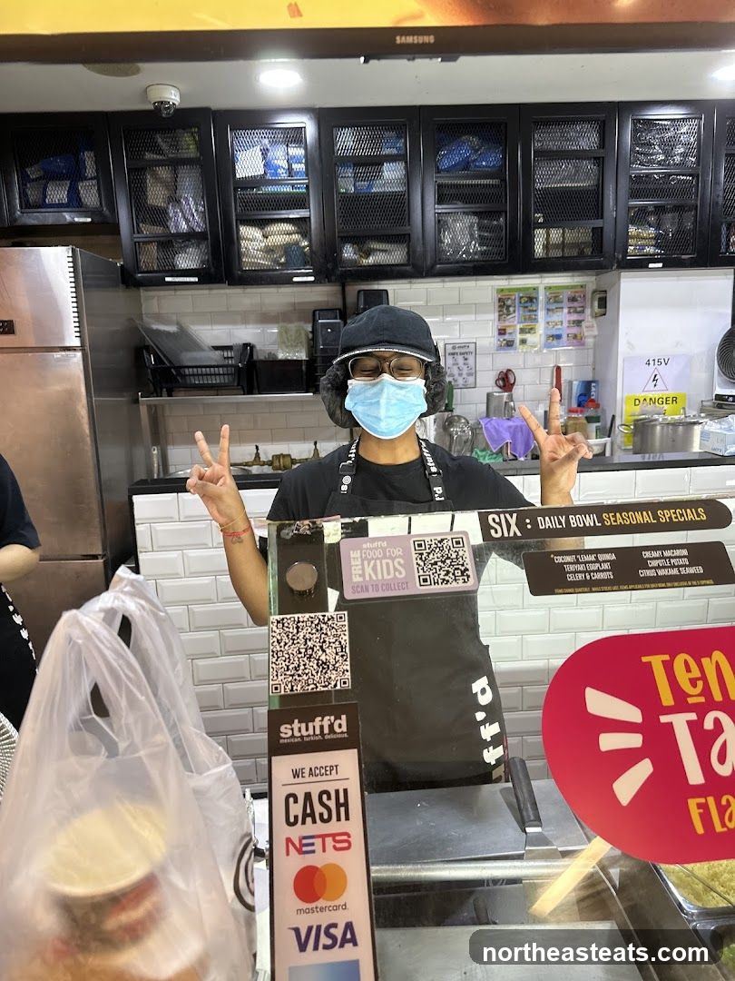Staff at a food counter