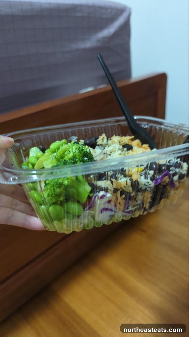 Salad in a clear plastic container