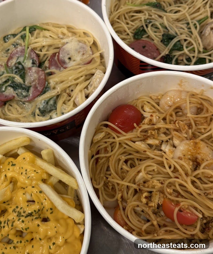 Four Bowls of Pasta and Fries