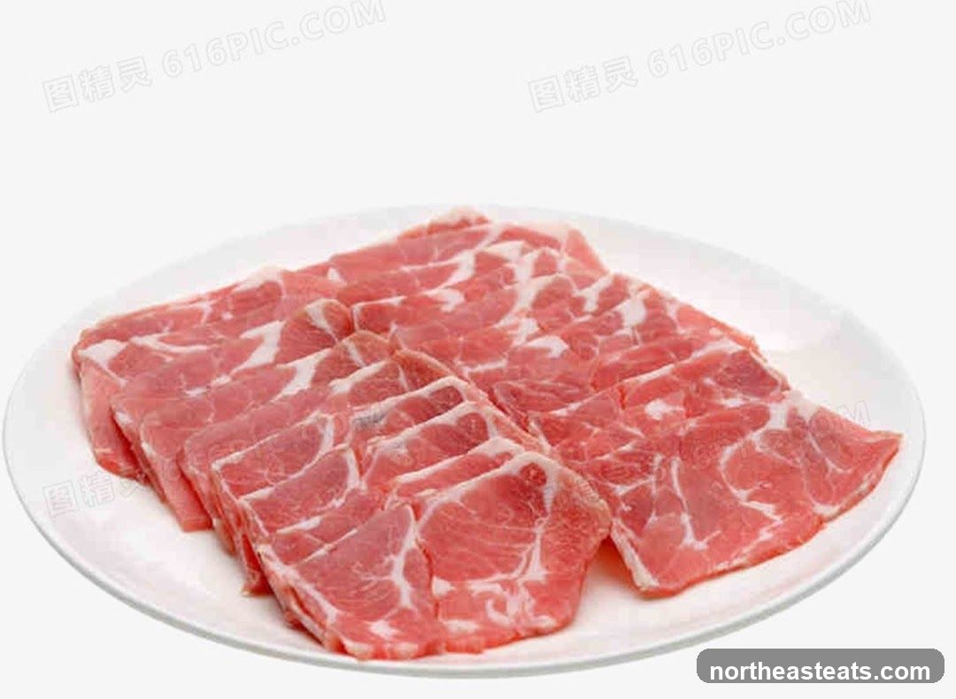 Thinly Sliced Raw Meat on a Plate