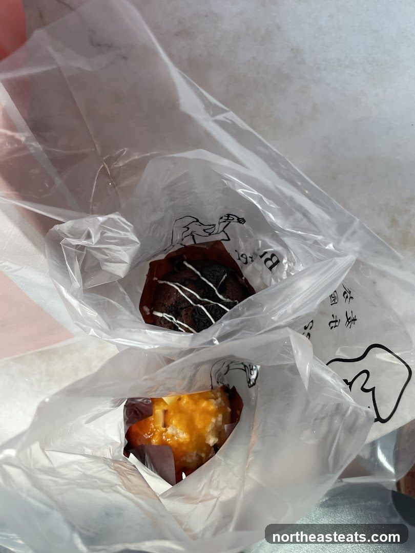 Two baked goods in plastic bags