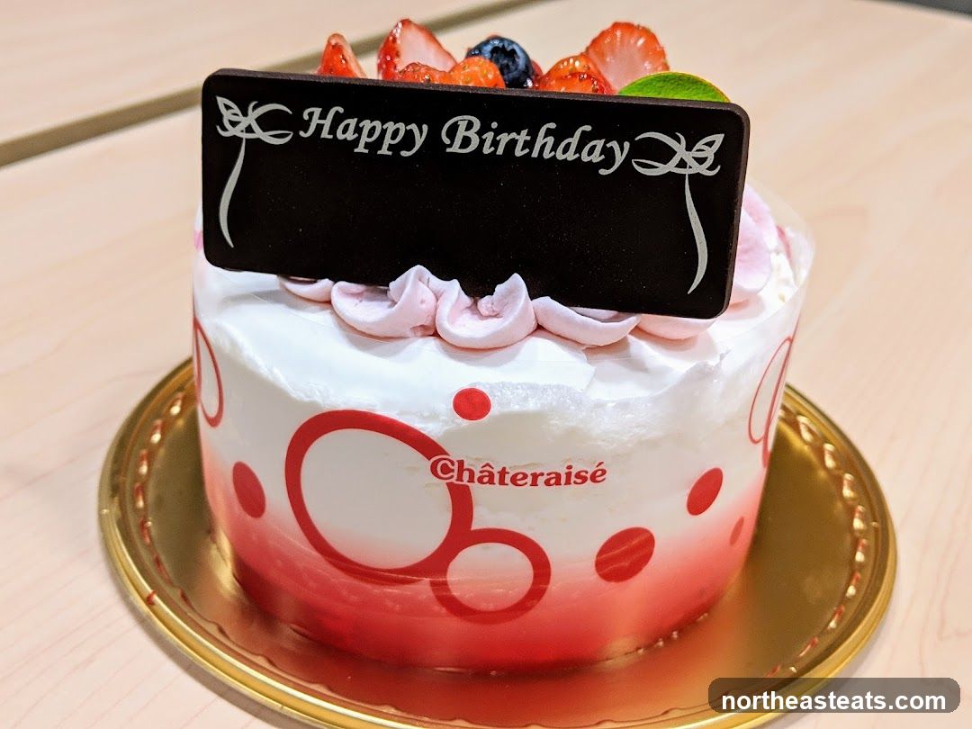 Birthday Cake with Fruit and Chocolate Plaque