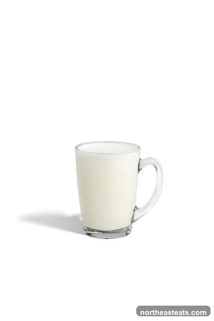 Glass mug of milk