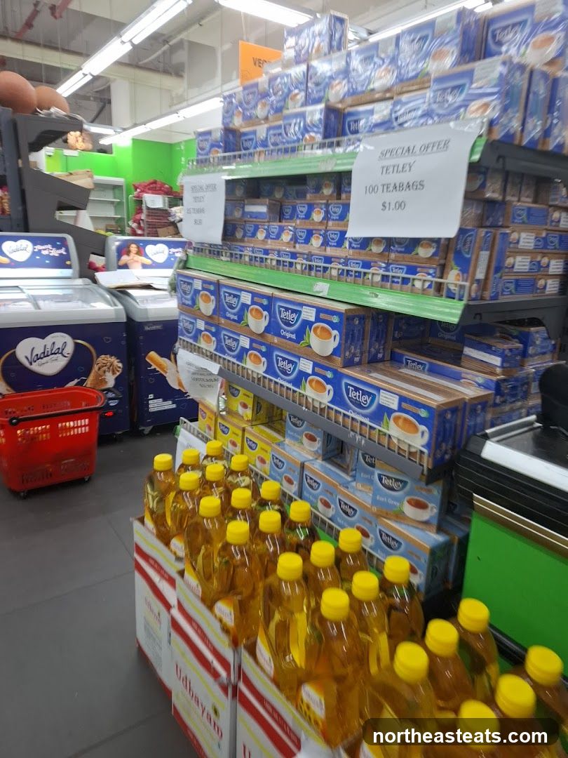 Supermarket aisle with tea and oil products