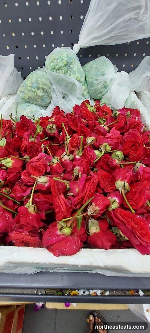 Red Roses and Green Buds