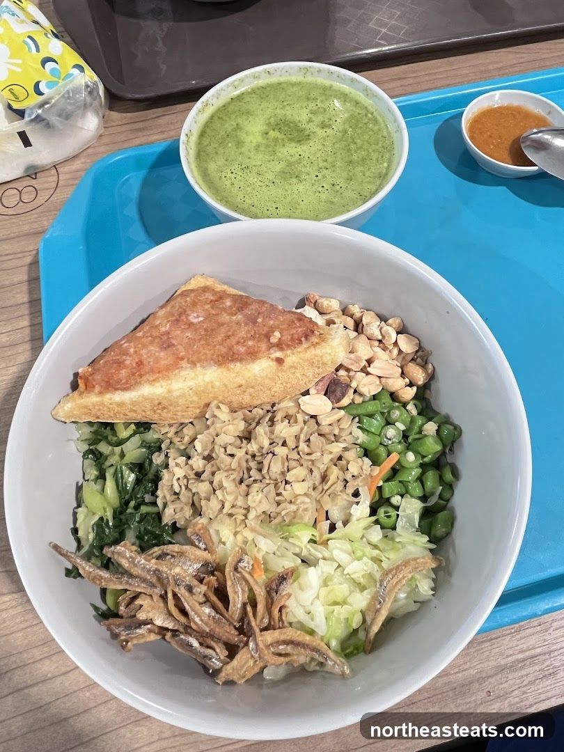 Bowl of food with green drink