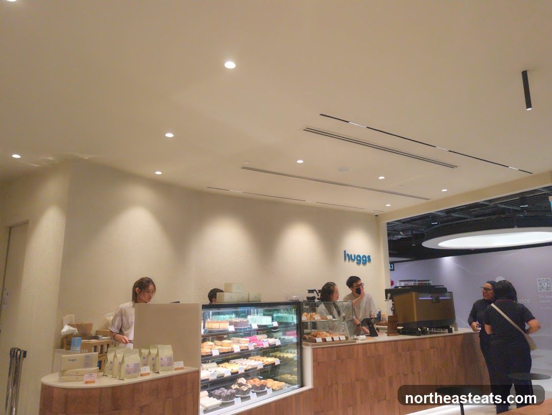 Cafe Interior with Desserts and Coffee Machine