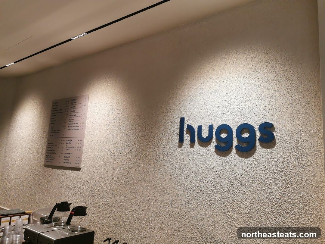 Huggs Coffee Menu and Signage