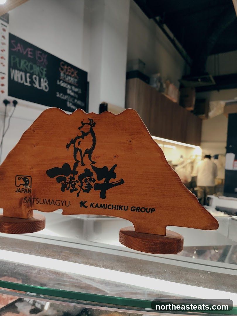 Wooden Sign with Bull and Japanese Characters