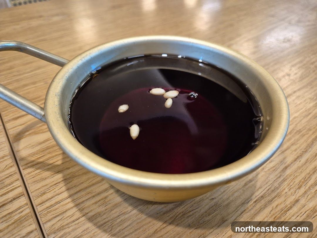 Sikhye in a Metal Cup