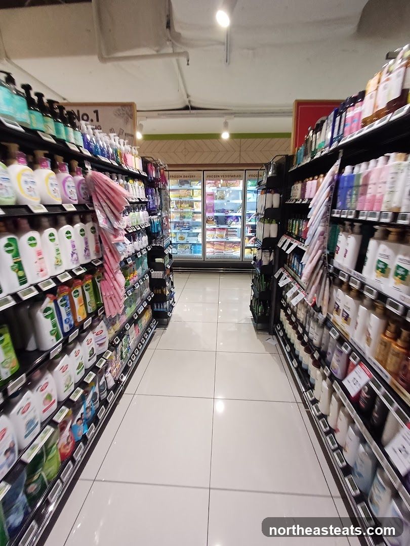 Supermarket aisle with personal care products and frozen food section