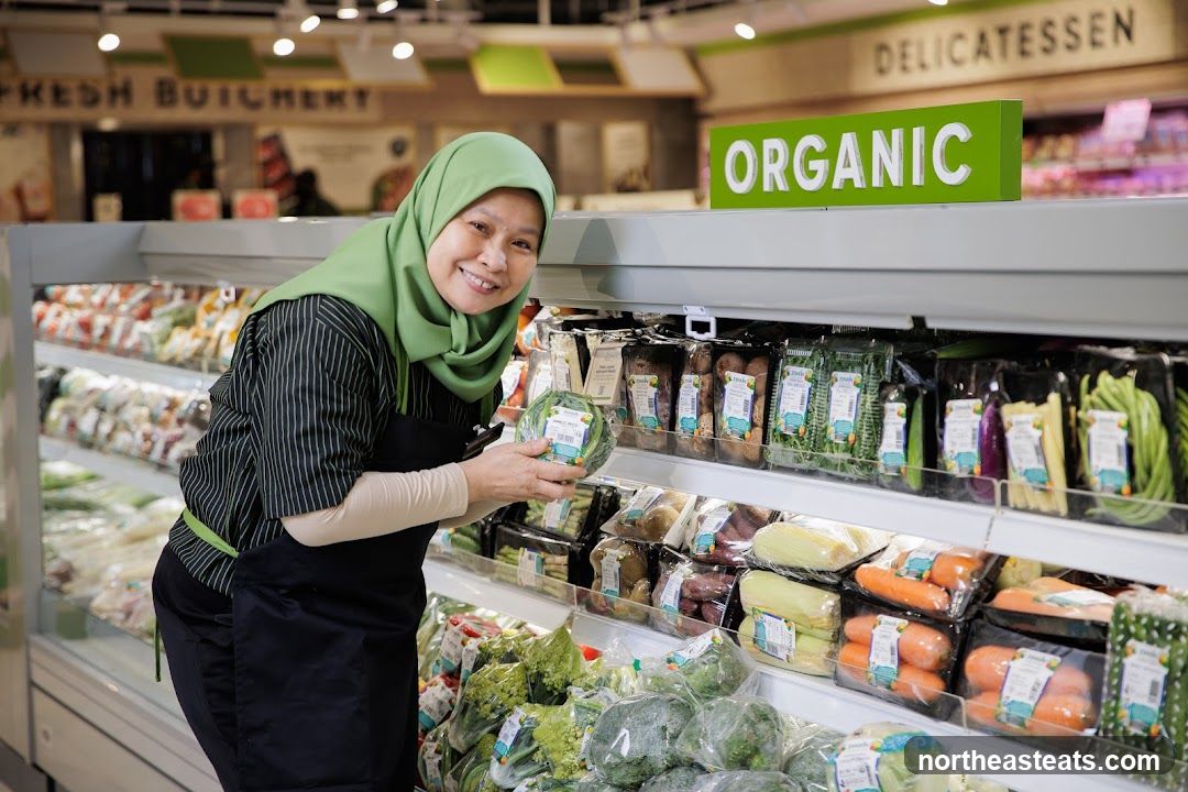 Grocery Store Employee with Organic Produce