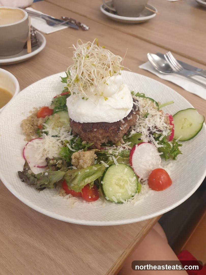 Salad with Poached Egg and Burger Patty