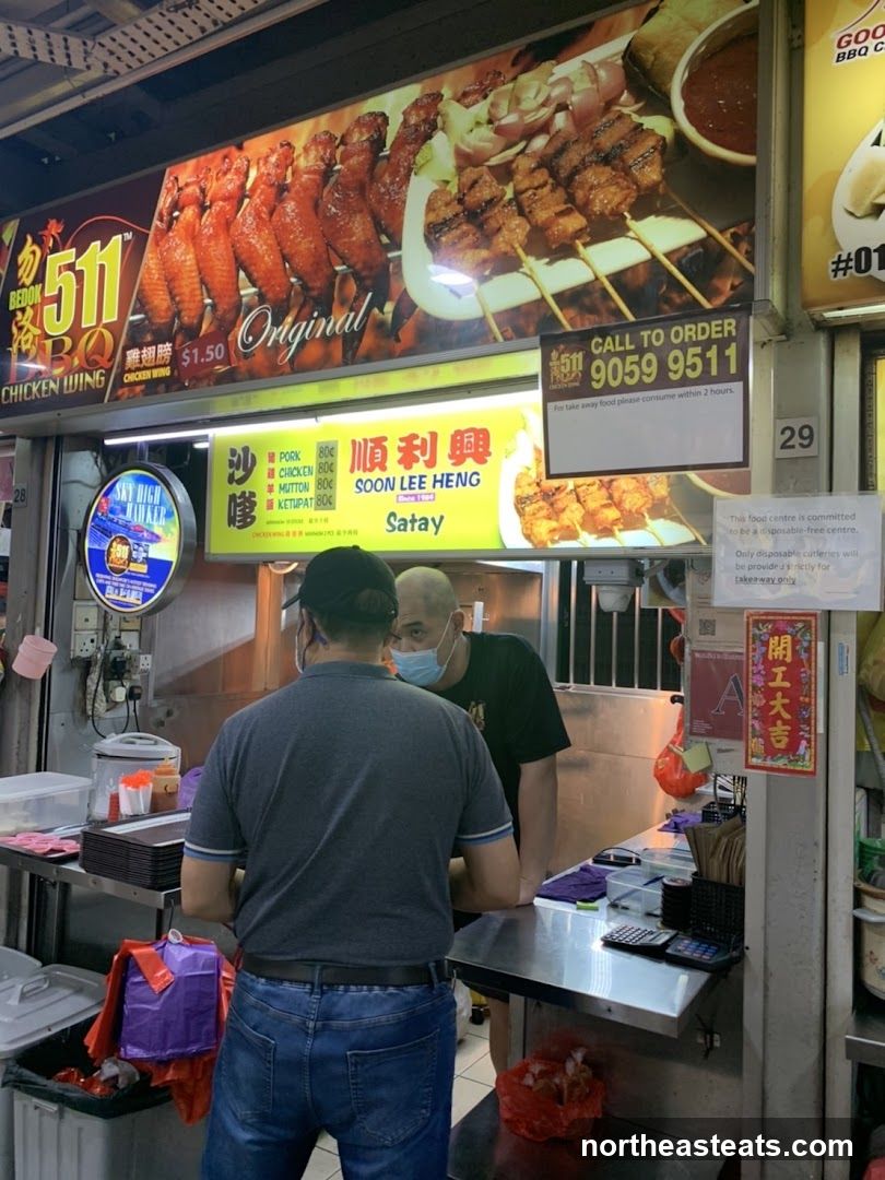 Food Stall with BBQ Chicken Wings and Satay