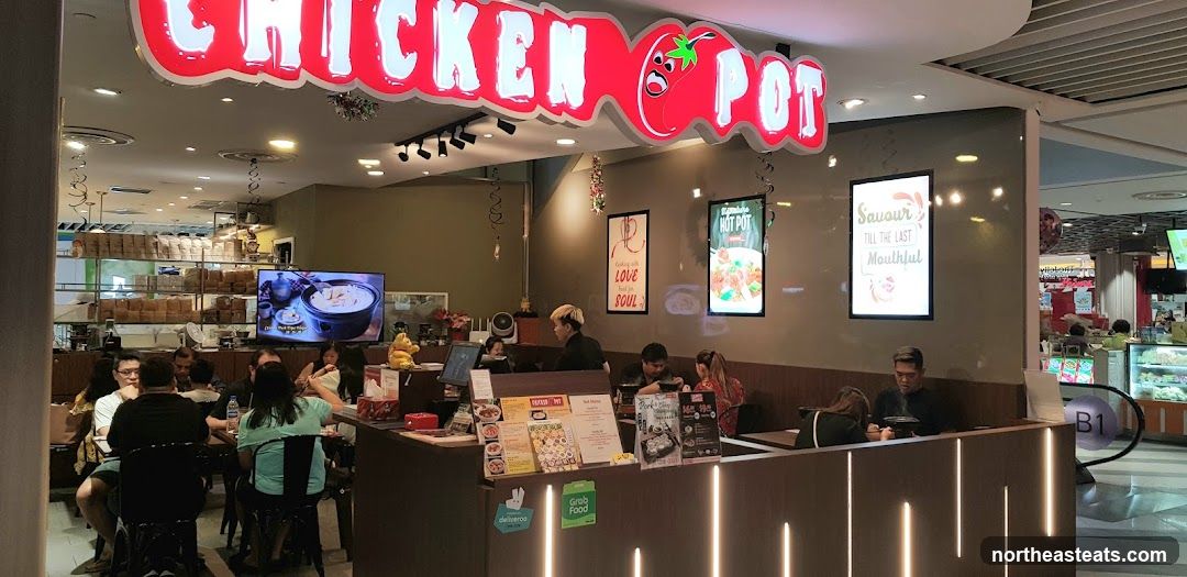 Restaurant Interior with "Chicken Pot" Signage