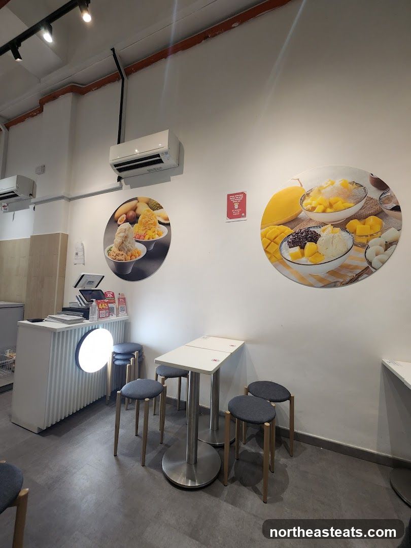 Dessert shop interior with seating and decor