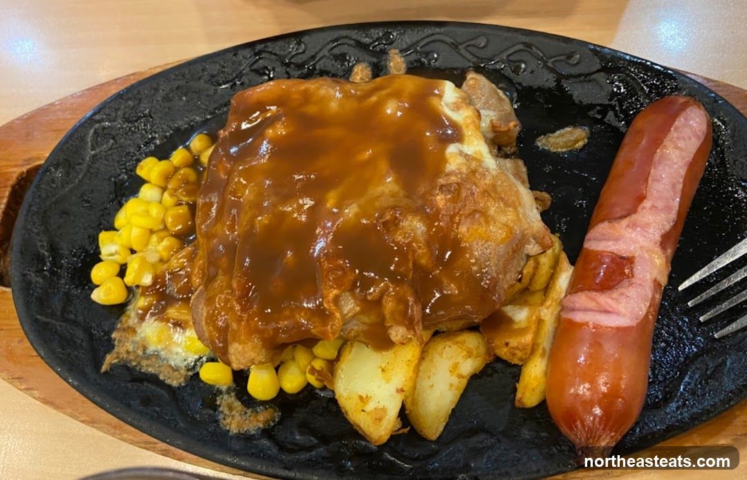 Sizzling Platter with Sausage and Fries