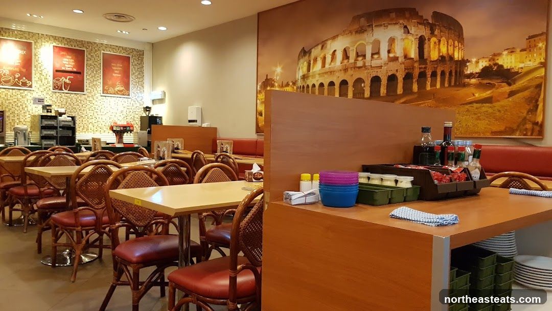 Restaurant Interior with Roman Colosseum Mural