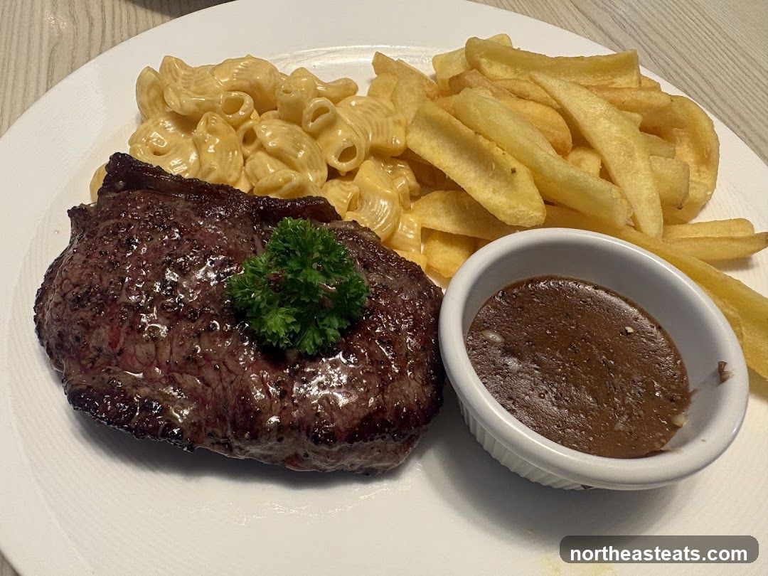 Steak with Macaroni and Cheese and Fries