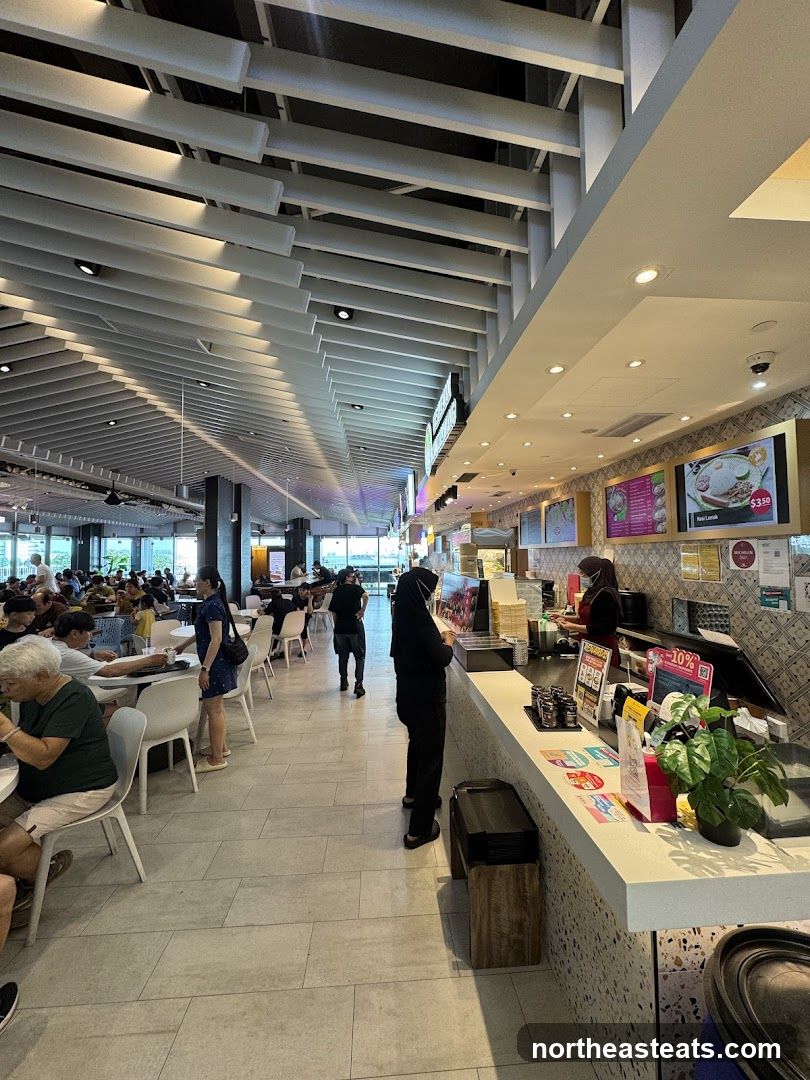 Food court with diners and food stalls