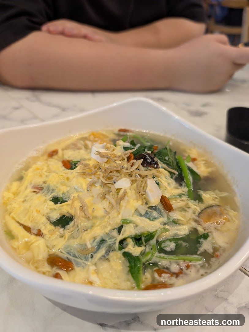 Bowl of Soup with Egg and Greens