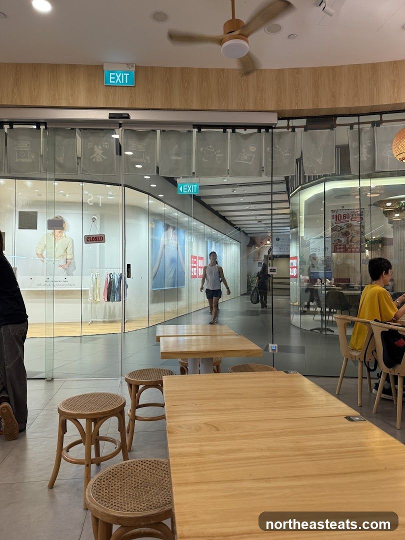Indoor seating area with view of shops
