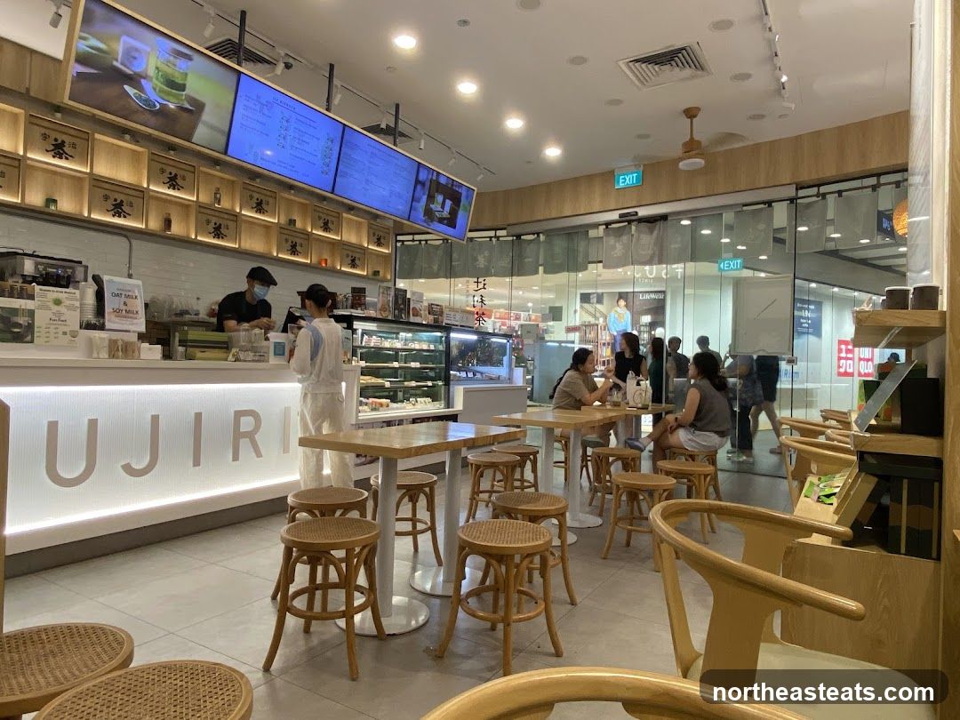 Interior of a cafe with seating and counter