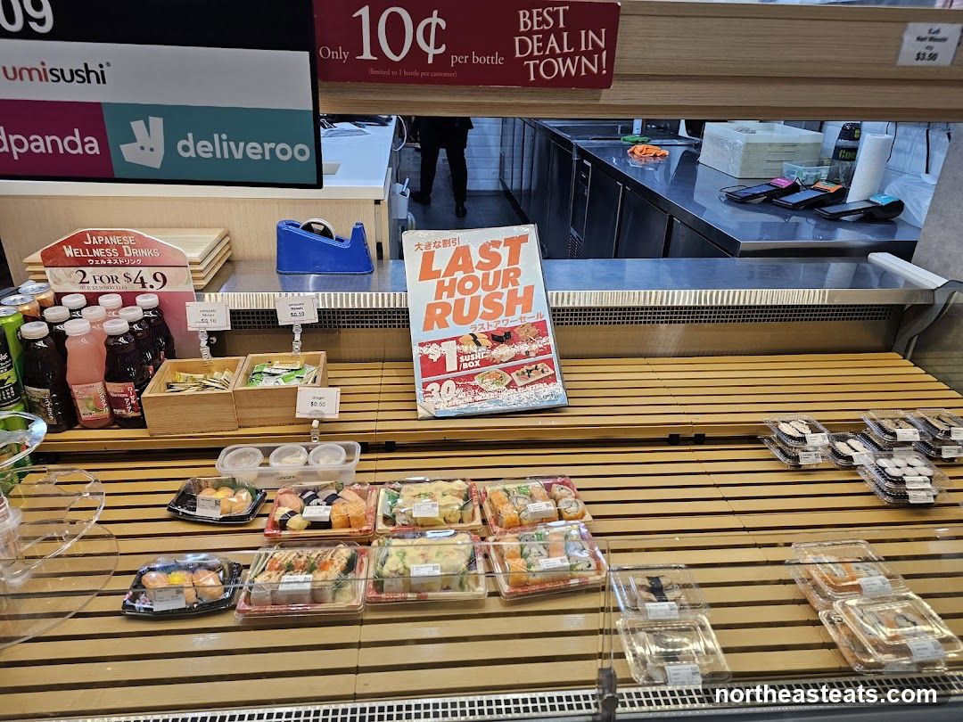 Sushi display with promotional signs