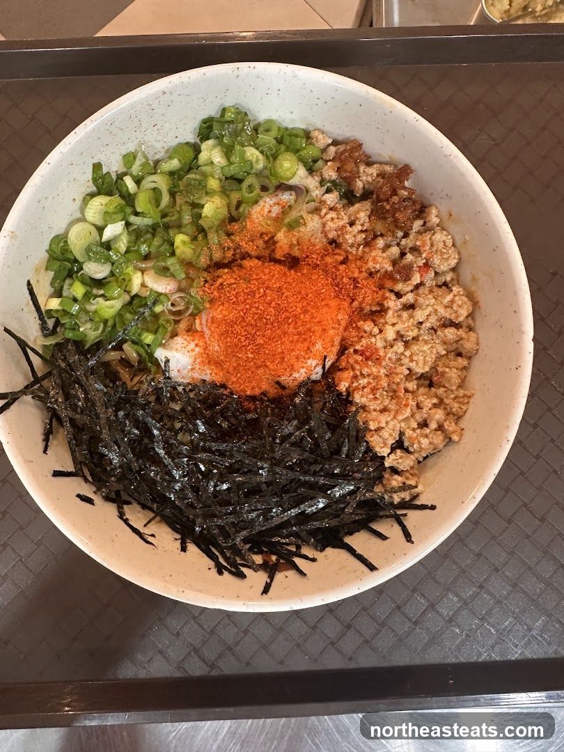 Bowl of food with toppings
