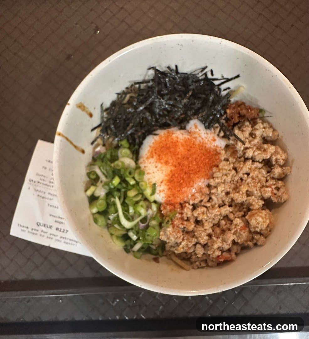 Bowl of noodles with toppings