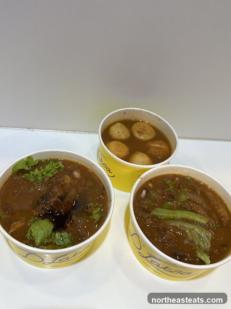 Three bowls of Asam Laksa