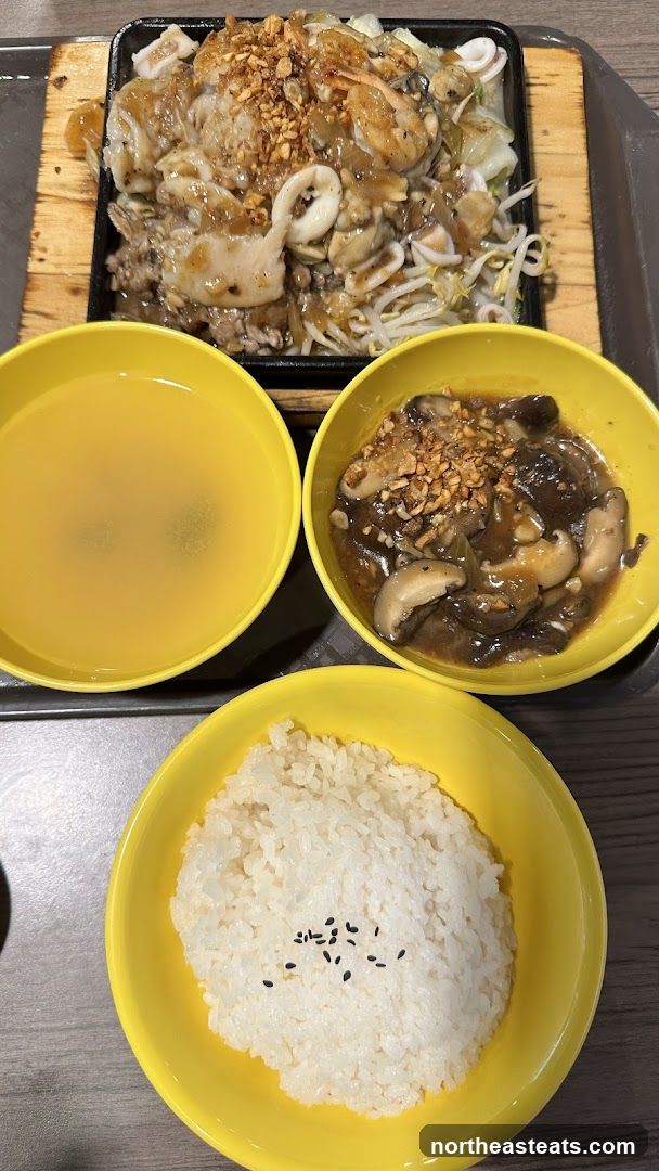 Seafood and Vegetable Sizzling Plate with Rice and Soup