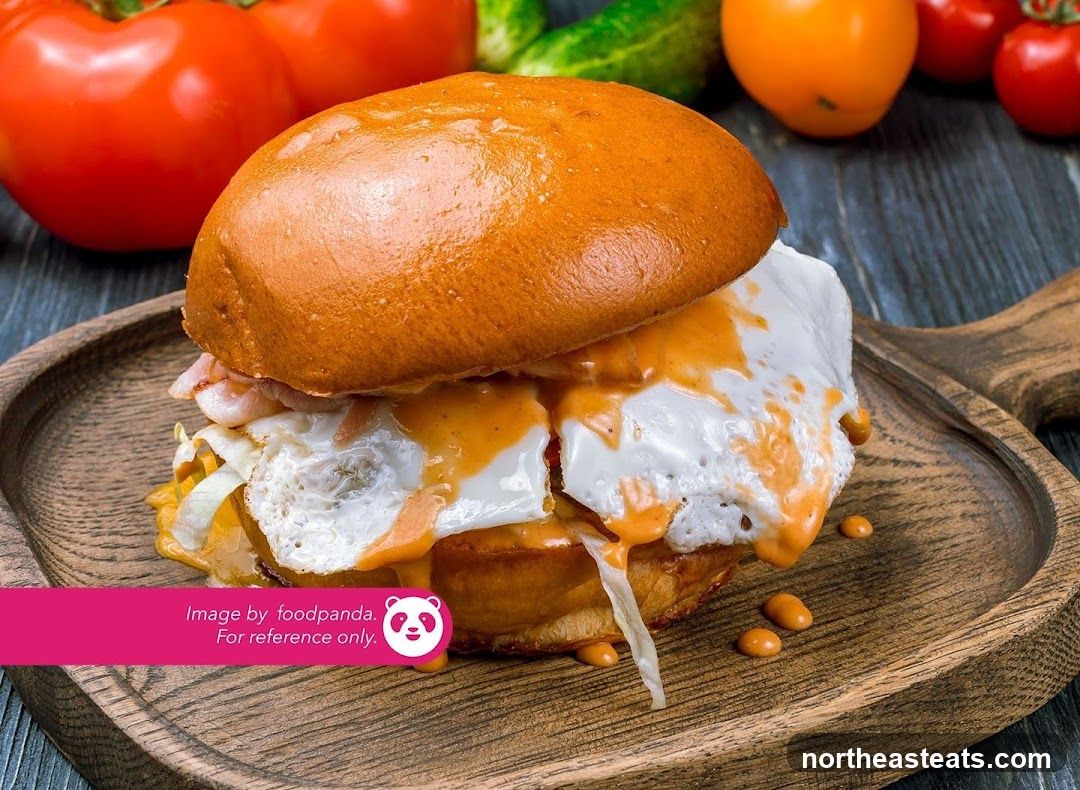 Burger with fried egg and sauce