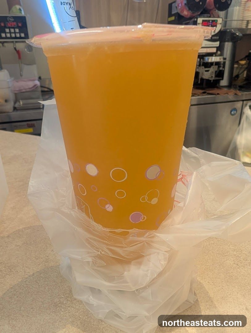Orange Drink in Plastic Cup