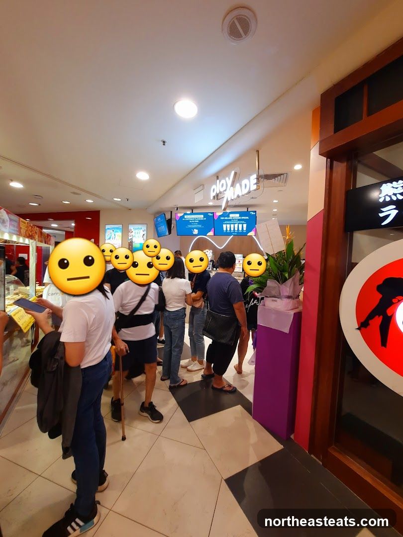 People queuing at a food establishment