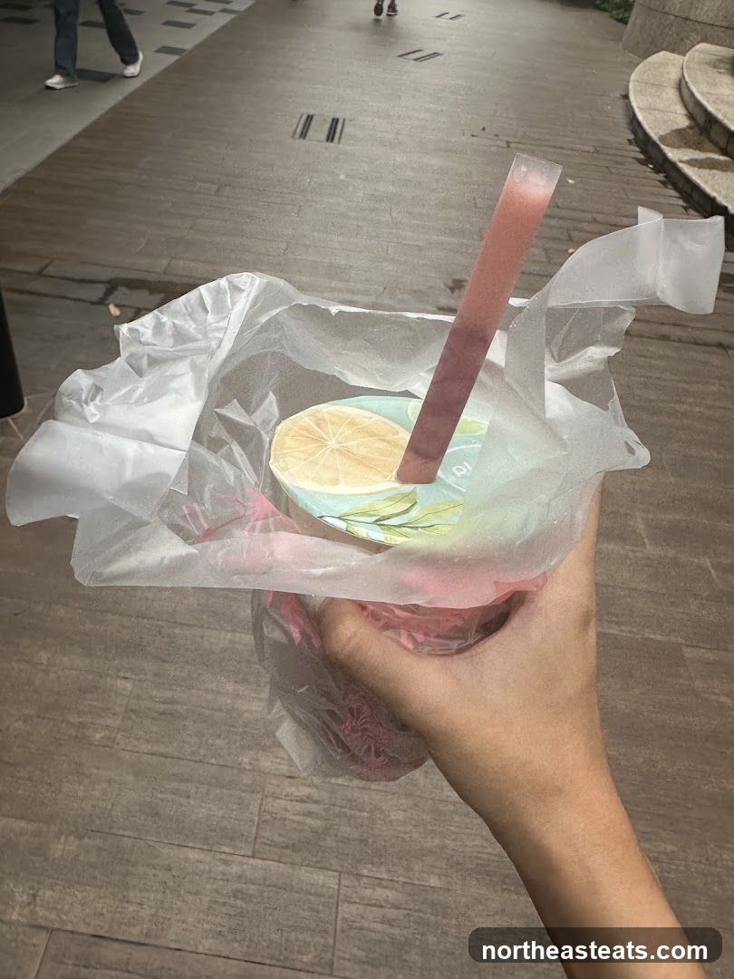 Hand holding a drink