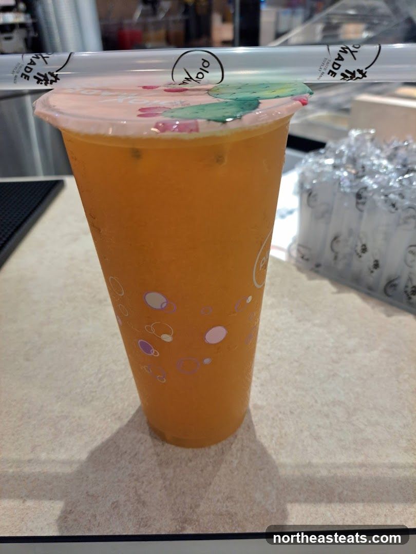 Orange Drink with Cactus Design Lid