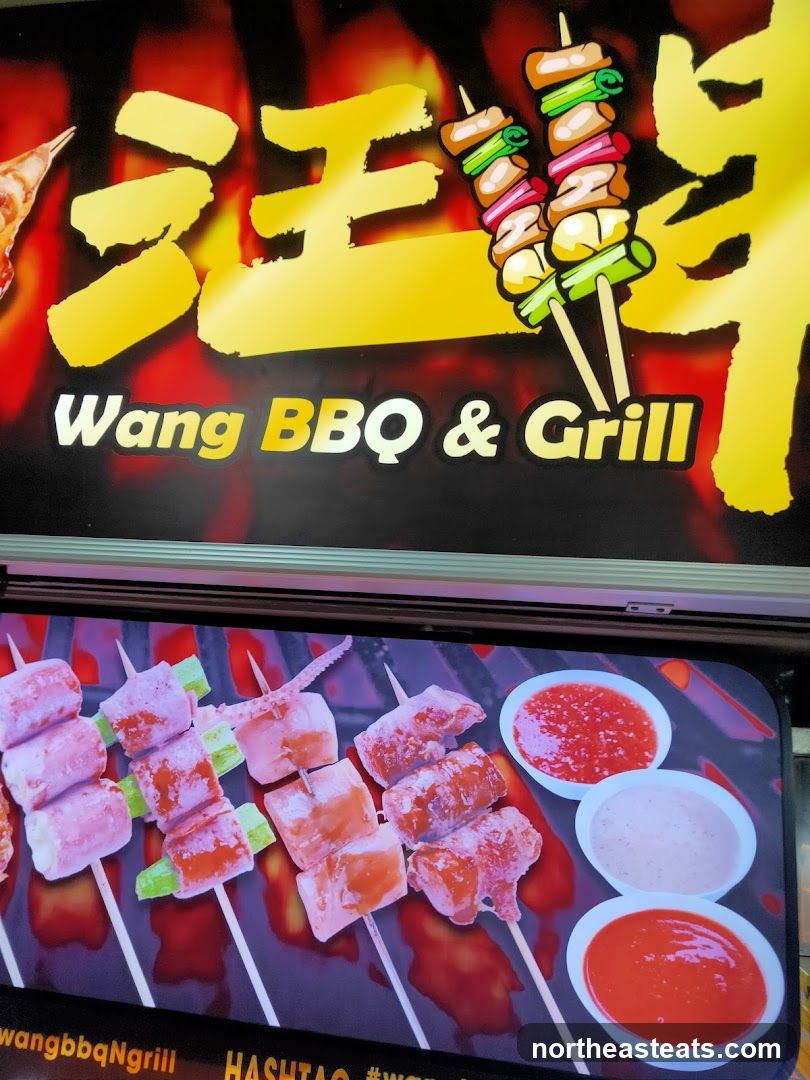 Wang BBQ & Grill Sign