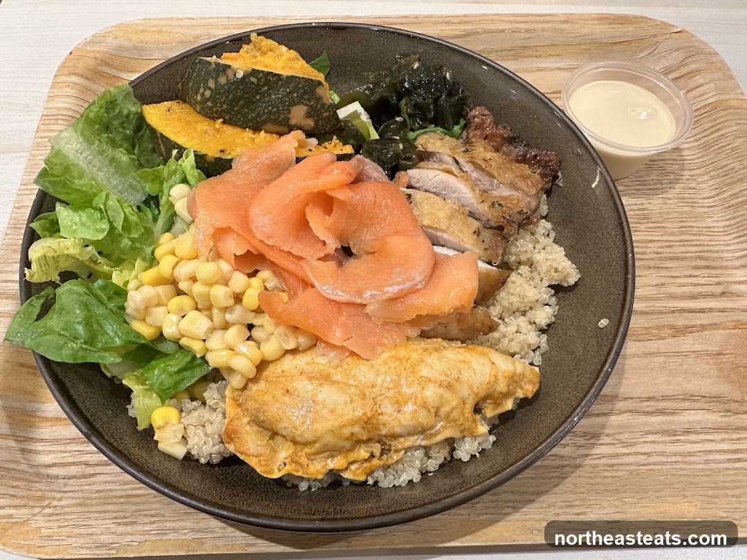 Salmon and Chicken Quinoa Bowl