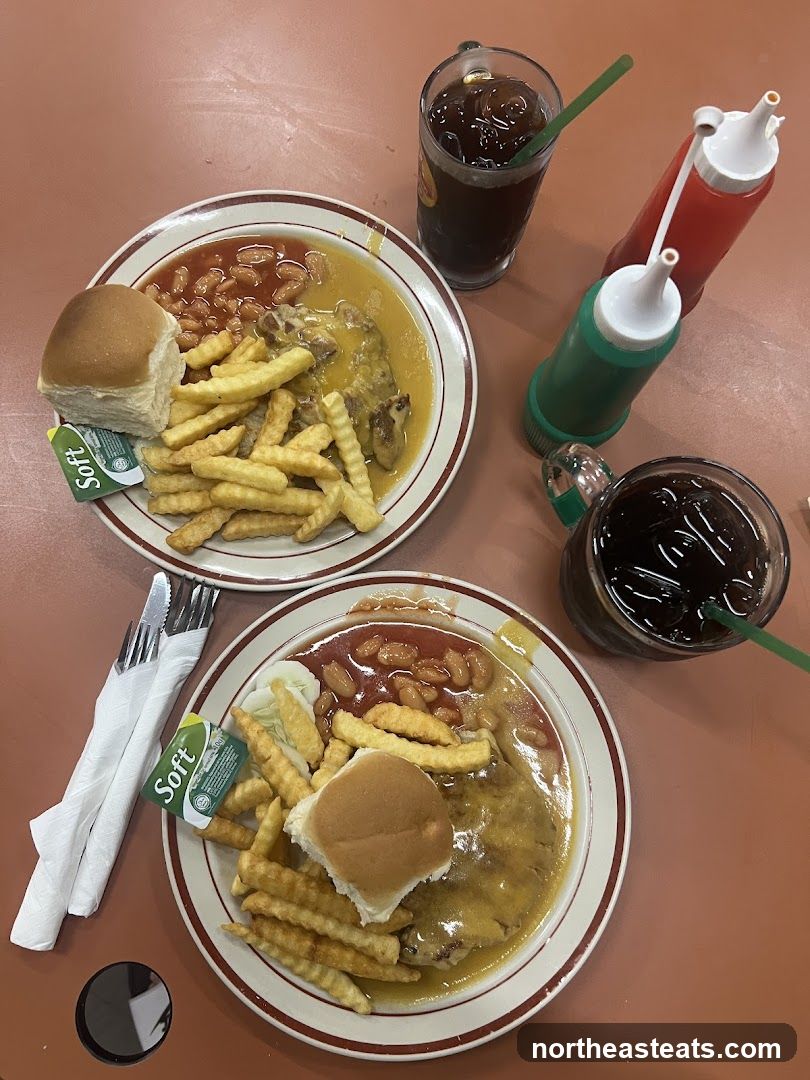 Two plates of food with drinks