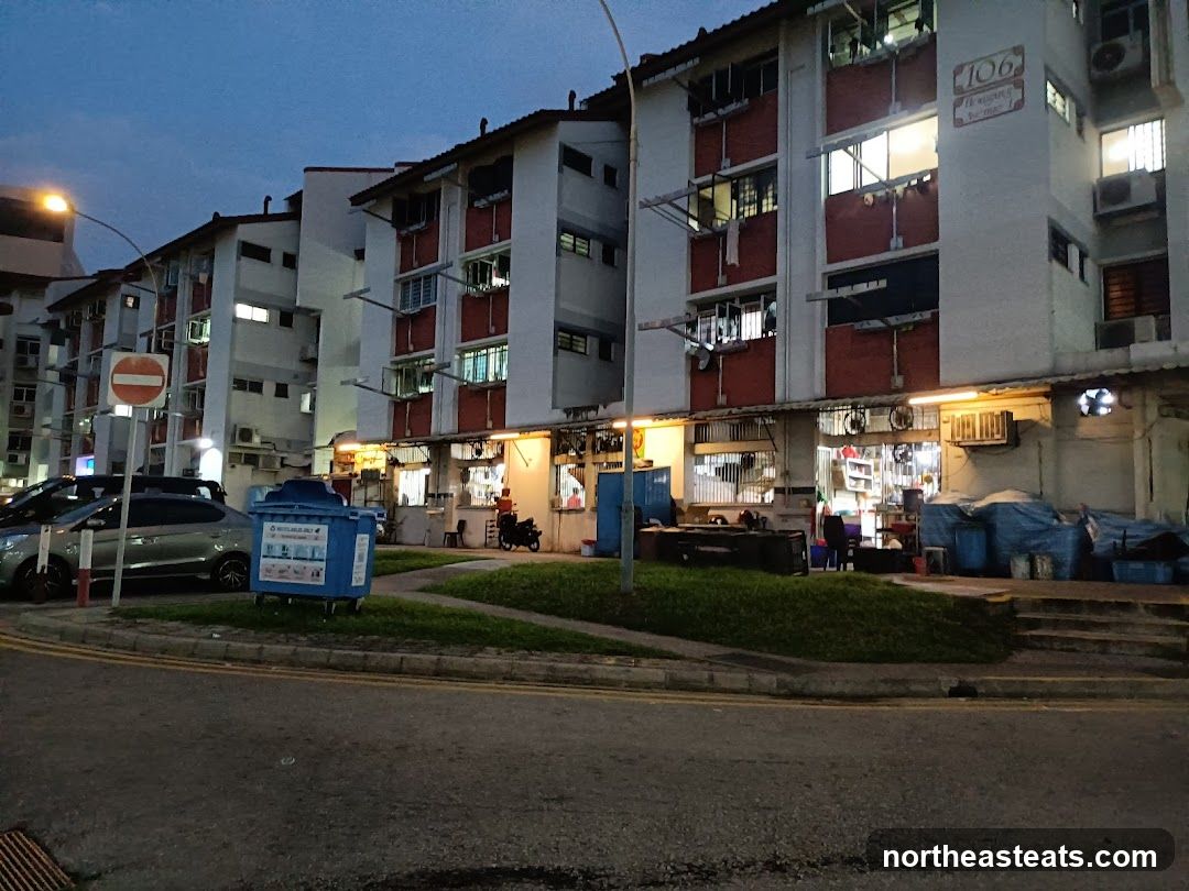 Apartment building with shops at ground level