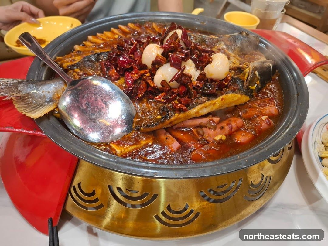 Spicy Fish Dish with Sausages