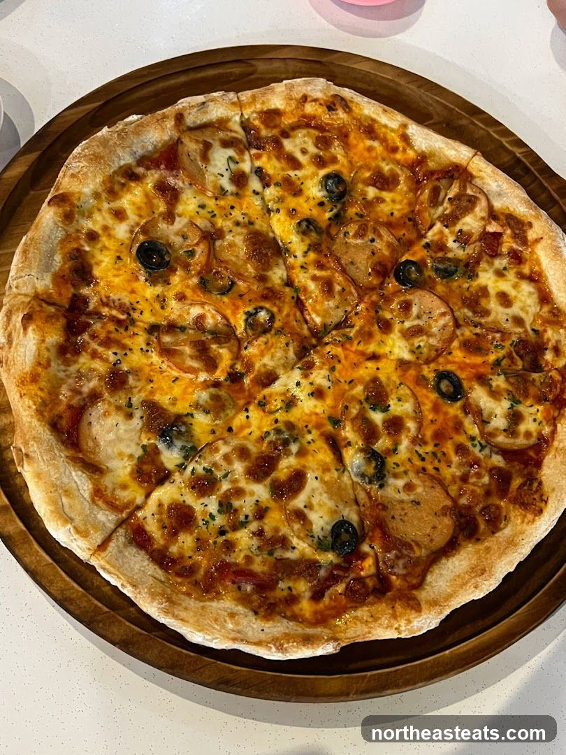 Pizza with Sausage and Olives