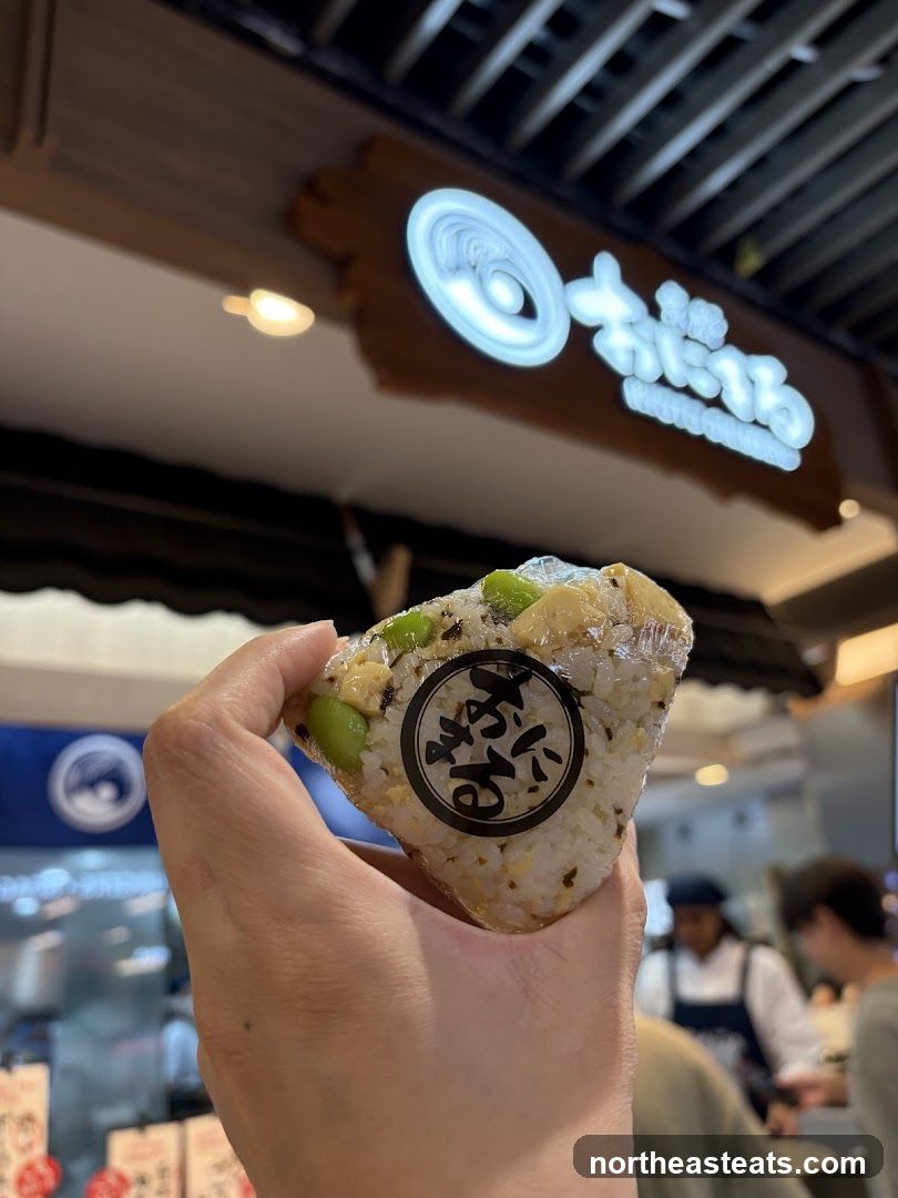 Onigiri with store signage in background