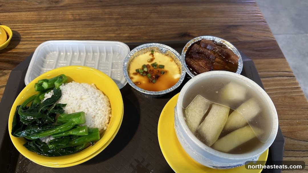 Meal Tray with Rice, Vegetables, Steamed Egg, Braised Meat, and Soup