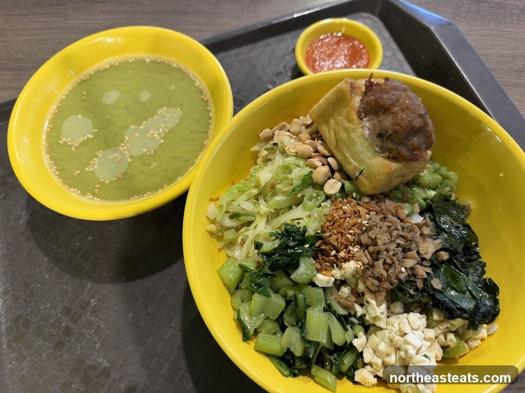 Rice bowl with soup and chili sauce