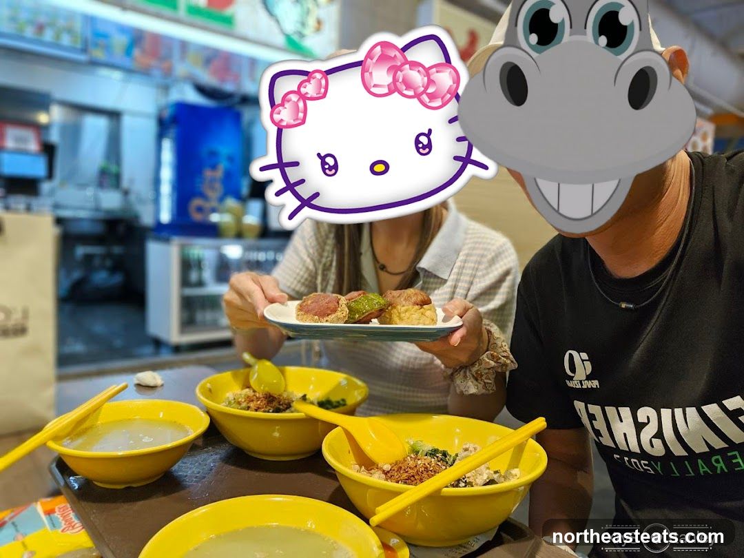 People eating at a food stall