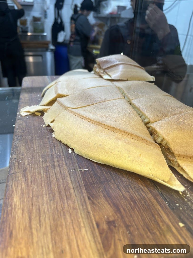 Sweet Crepes on a Wooden Board