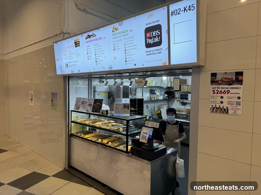 Food stall with menu and hiring poster